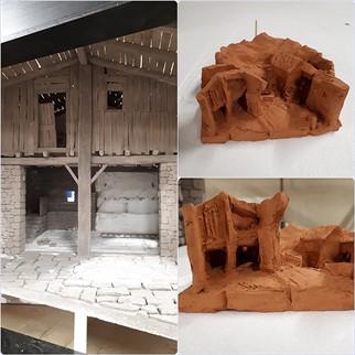 La maqueta, en barro, y un detalle del primer término de uno de los belenes